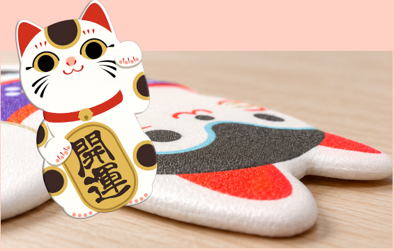 ふっくらとした厚みのある招き猫のステッカー